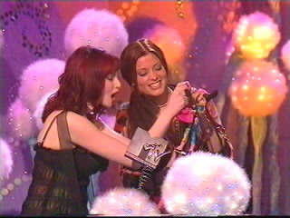 Sophie Ellis-Bextor and Holly Valance present the award for 'Best Pop' to Kylie Minogue